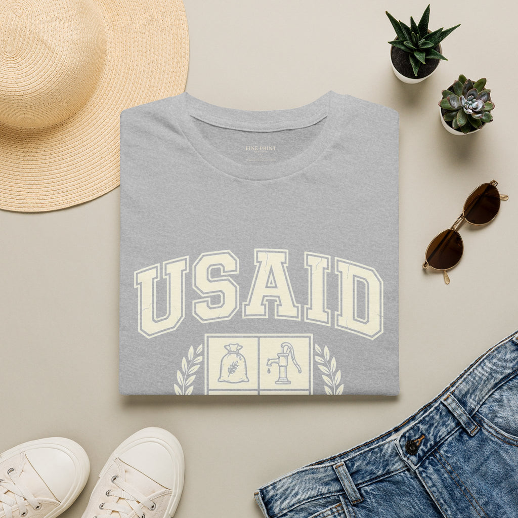 USAID Crest Pride T-Shirt — Vintage style 'Property of the American People' Graphic Tee