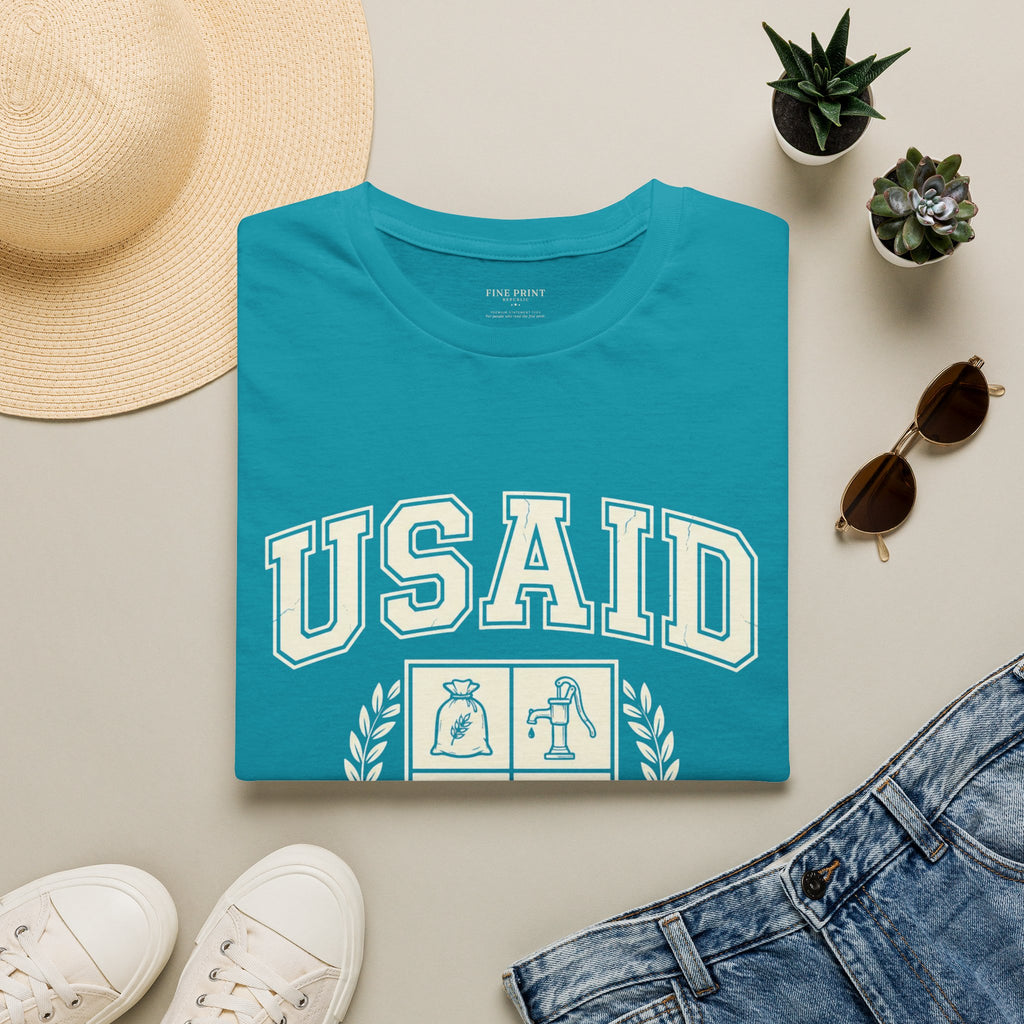 USAID Crest Pride T-Shirt — Vintage style 'Property of the American People' Graphic Tee